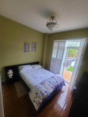 ABOVE Ground 1 Bedroom Suite in a House